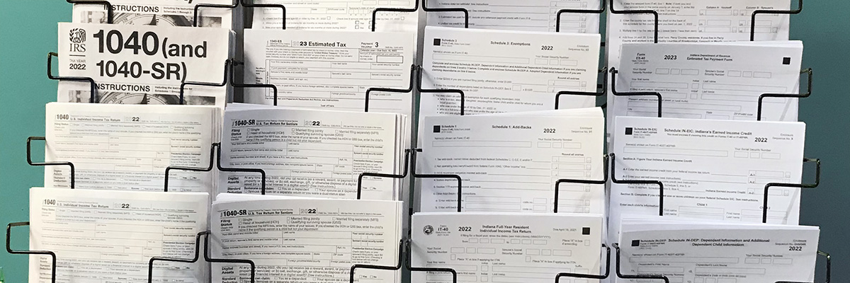 A display of a variety of federal and state tax forms at the library.