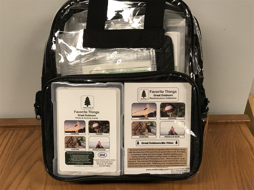 backpack filled with items for "Favorite Things: Great Outdoors Reminiscence"