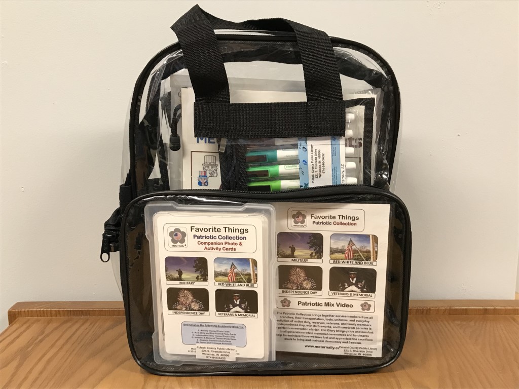 backpack filled with items for "Favorite Things: Patriotic Collection"