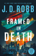 book cover for "Framed in Death" featuring artful smudges of paint above a nighttime city skyline