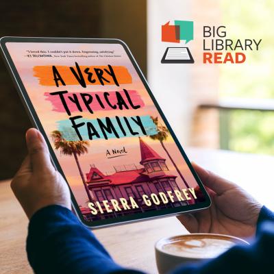 Person holding a tablet displaying the cover of the ebook "A Very Typical Family"