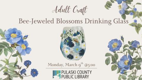 a rounded drinking glass hand-painted with blue and white flowers and bees, centered in an image with surrounding blue flowers