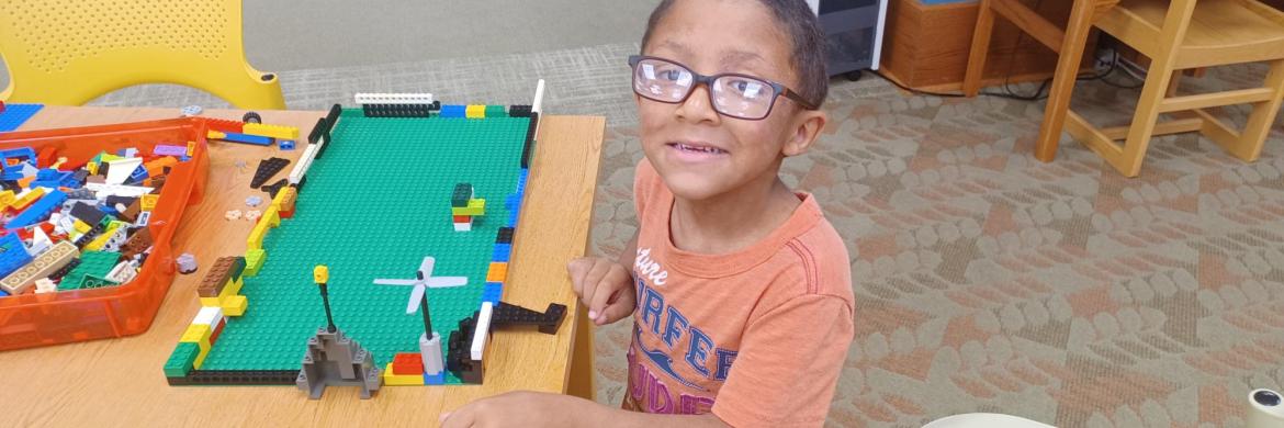 Young boy playing with Legos